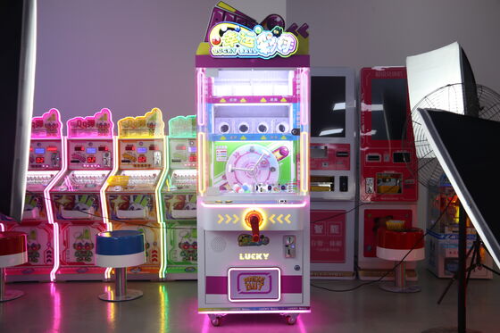 Machine de jeu d'arcade à griffes pour attraper des balles porte-bonheur à pièces